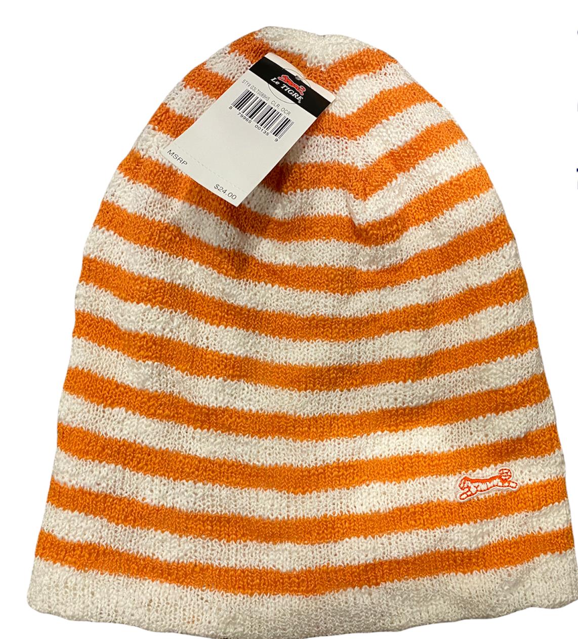 The Stylish Genuine Le Tigre Knit Hat Winter Beanie in Orange & White features a striped design with a tag attached at the top, a small embroidered red logo on the side, and is made from 100% acrylic for ultimate warmth.