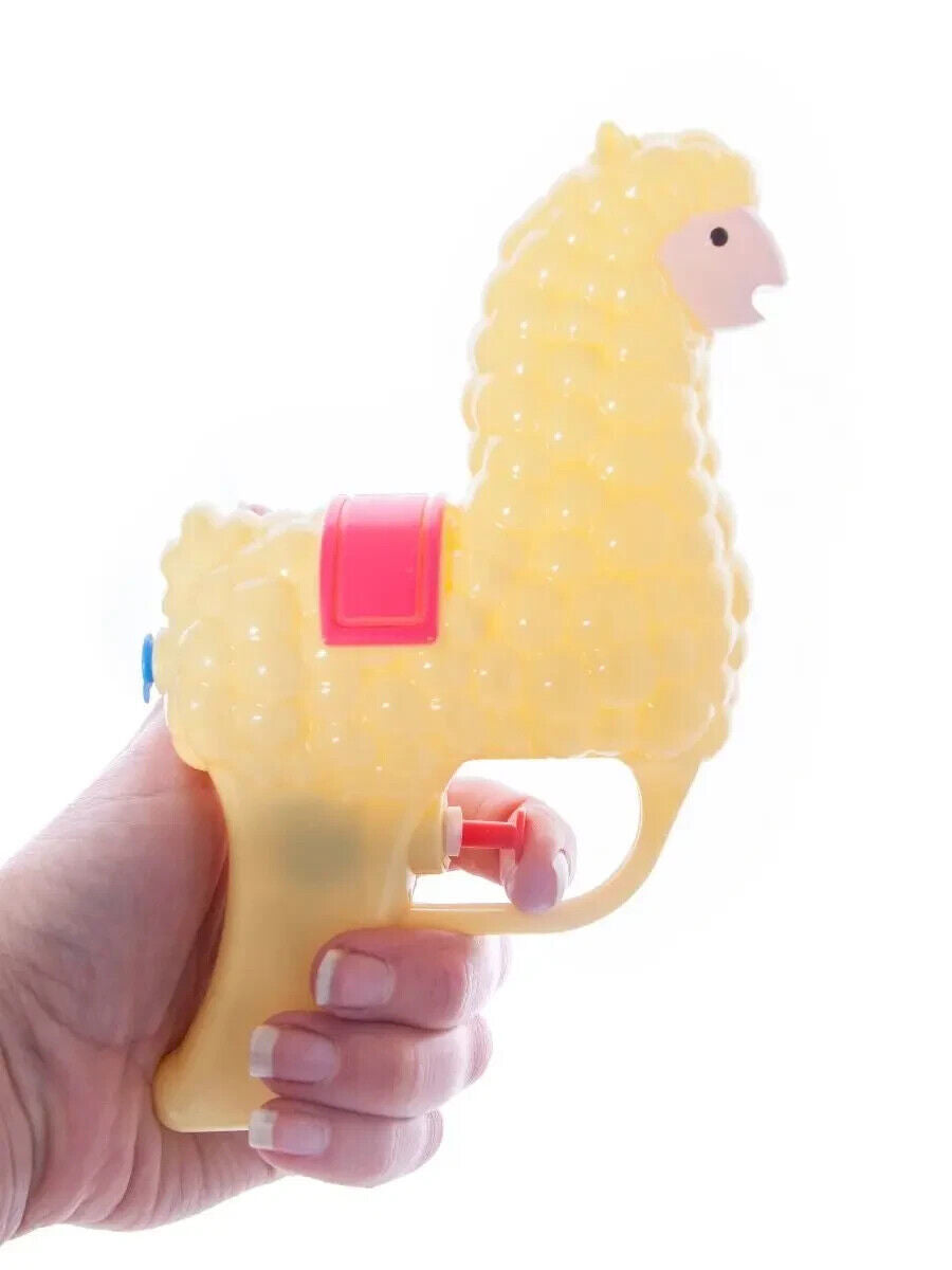 Hand holding a SPITTIN' LLAMA Water Pistol Squirt Gun - Funny Child Spray Soaker Kids Toy, featuring a pink saddle, set against a white background.