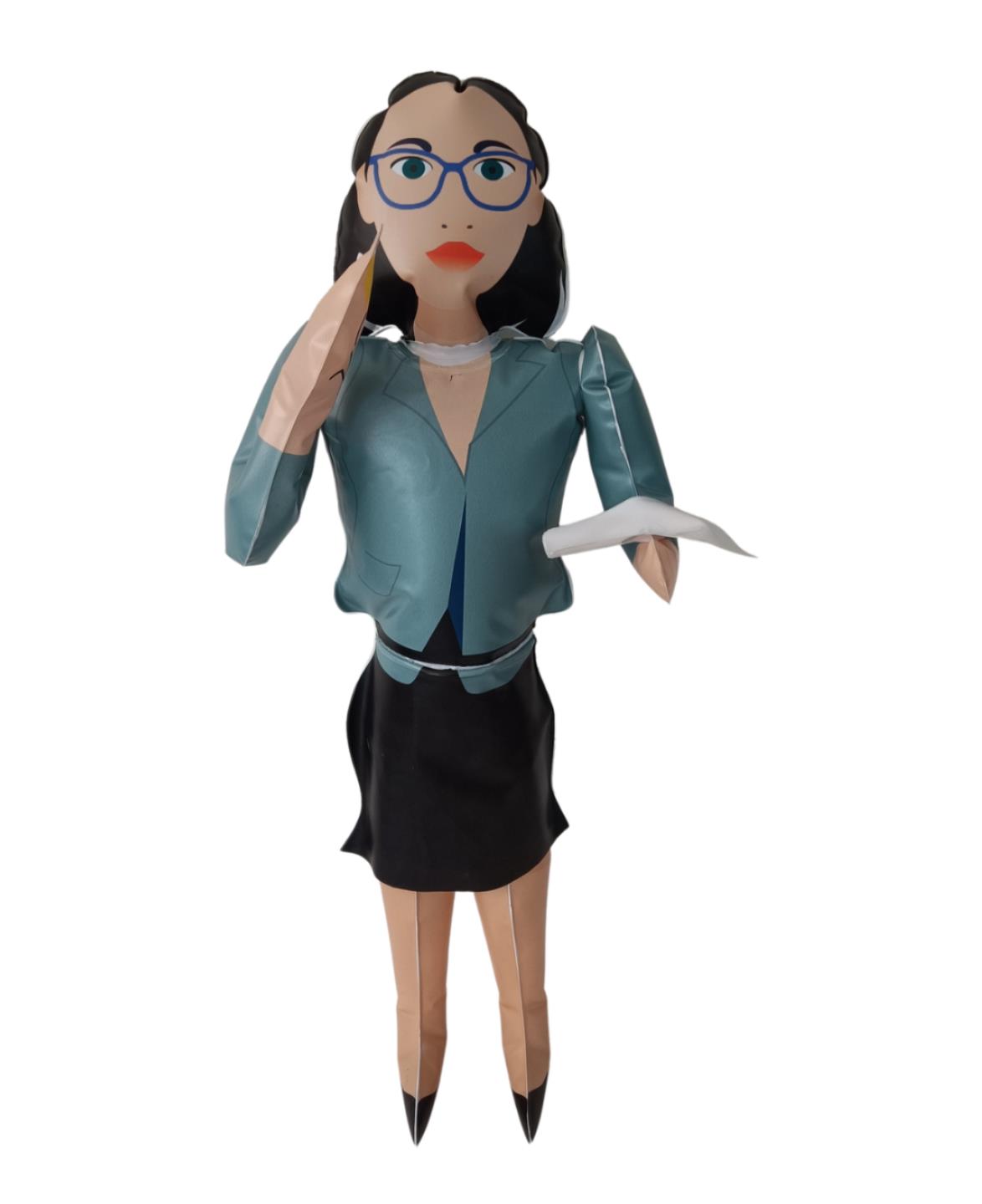 Styled as a paper doll, the Inflatable Blow Up Therapist comes complete with glasses, a teal blazer, a black skirt, and a notebook—making it an ideal novelty gift.