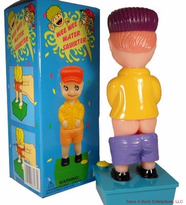 A toy figure with lowered pants that squirts water, named the "New Classic Gag Prank - Squirting Wee Wee Pee Boy Water Squirter Toy Joke," next to its packaging, promises classic prank fun and hysterical laughter for all.