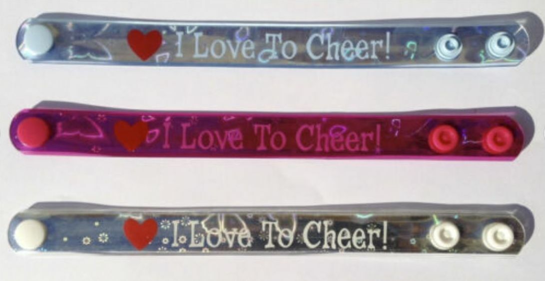 50 pulseras deportivas de animadora "I Love To Cheer" 4 colores - Pulseras a presión