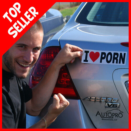 A man attaches one of the 4 Prank Car Magnets, specifically one that says "I ❤️ Porn," to the back of a car. The image, showcasing these hilarious magnetic bumper signs, features a red "Top Seller" label in the corner.