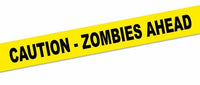 A fun and eerie gag joke prank perfect for Halloween or Walking Dead fans: the "Caution-Zombies Ahead - Crime Scene Police Tape," featuring bold black text on yellow tape with the warning "CAUTION - ZOMBIES AHEAD.