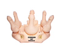 The Inflatable Crown of Dicks - Funny Adult Bachelorette Hen Party Gag Joke Hat Gift is a soft fabric inflatable crown adorned with multiple phallic shapes and the text "CROWN OF DICKS" printed on the front, making it an ideal and hilarious gift for any bachelorette party.