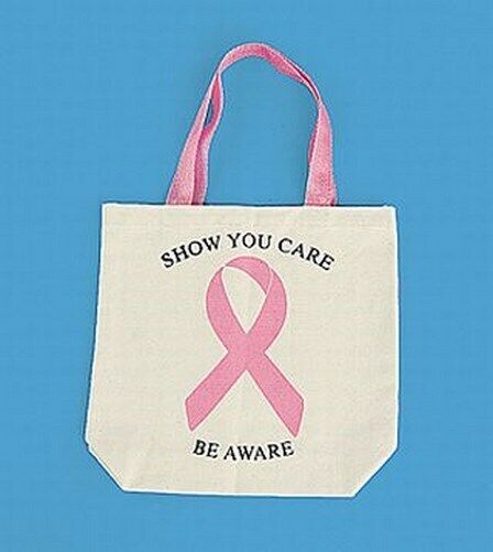 The 12 Pink Ribbon Breast Cancer Awareness Canvas Tote Bags, each with pink handles and a large pink ribbon along with the message "Show You Care, Be Aware" on a light blue background, are perfect for promoting breast cancer awareness at fund-raiser events.