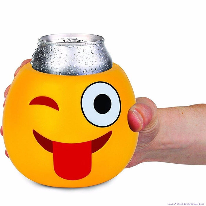 A hand holding a yellow, round CRAZY WINKING EMOJI - Drink Can Bottle Beer Soda Cooler Foam Cooler by BigMouth, containing a cold, perspiring can. This insulated can holder features a playful winking face to keep your drink chilled in style.