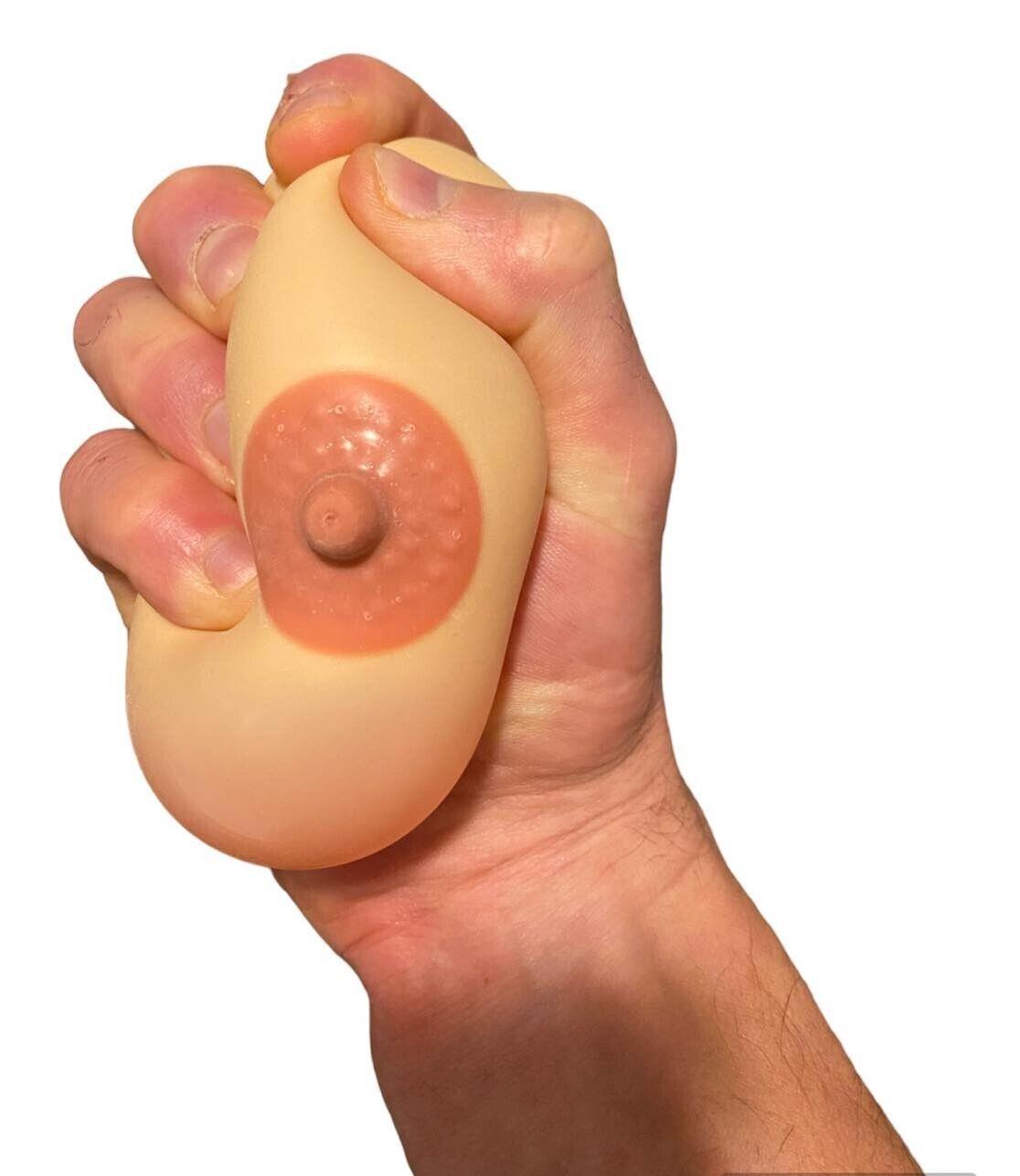 Experience a laugh-inducing moment with the 2pk Stress Boobs - Squeeze Boobies Feels Real! Adult Novelty Breast Man Toy Gift, ideal for anyone who enjoys a good gag gift or wants to effortlessly refine their juggling skills.