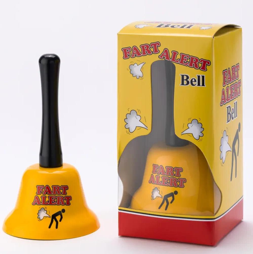 A yellow bell with a black handle that reads "Fart Alert" is displayed next to its packaging, which shares the same humorous text and design. The FART ALERT Hand Bell - Funny Joke GaG Gift - Farting Stink Bomb Warning features a whimsical warning system and comes in a box depicting a person releasing gas, making it an ideal gift for pranksters.