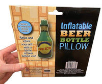 A person holds packaging for an "Inflatable Beer Bottle Bath Hot Tub Pillow," a perfect gag gift featuring a beer bottle graphic and humorous text that promotes relaxation and comfort—an ideal party favor to lighten up any celebration.