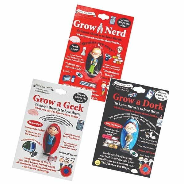 Three vibrant toy packages labeled "Grow your own Dork," "Grow your own Nerd," and "Grow your own Geek." Each package features a figurine with humorous text highlighting the distinctive traits of dorks, nerds, and geeks.