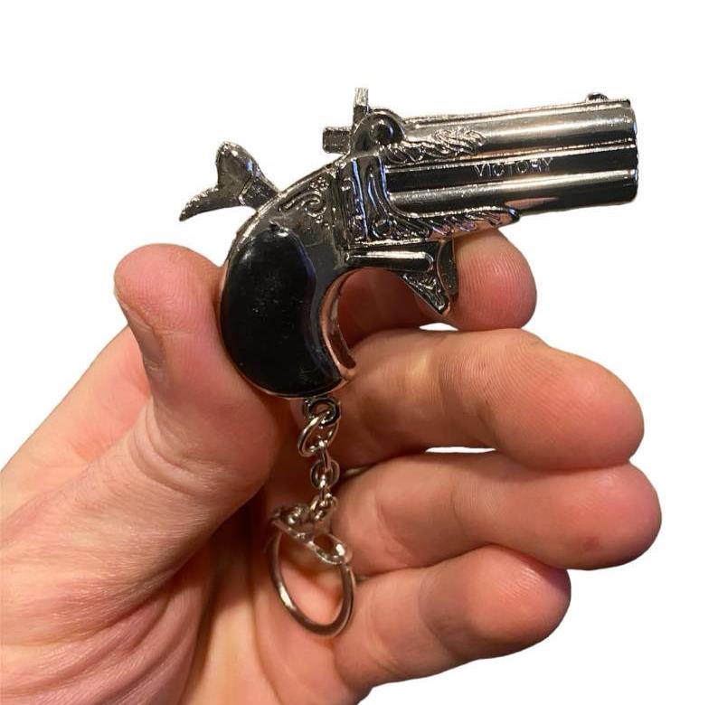 12 Vintage 80's mini key chain diecast metal pistol cap gun - die cast display