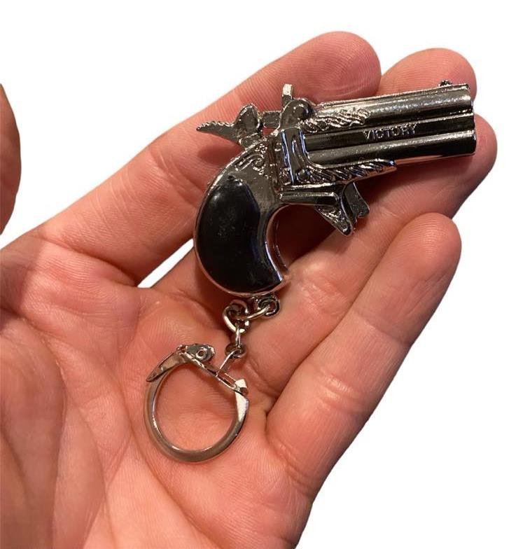 12 Vintage 80's mini key chain diecast metal pistol cap gun - die cast display