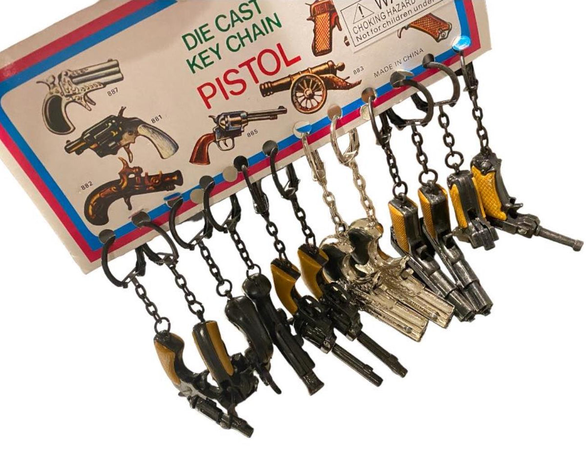 12 Vintage 80's mini key chain diecast metal pistol cap gun - die cast display