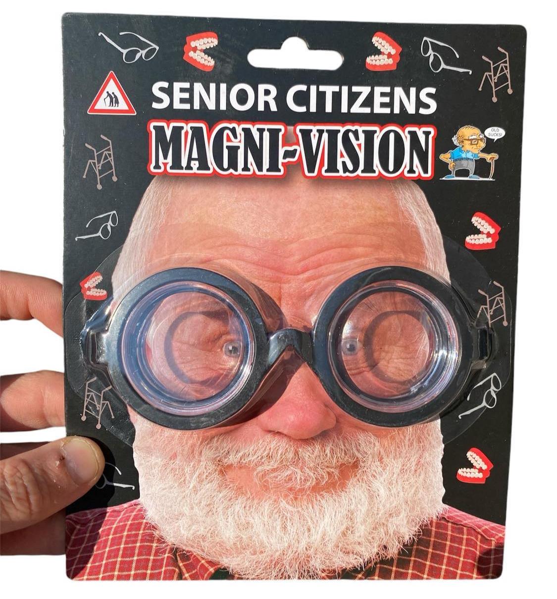 Delight in some comedic moments with the "Senior Citizens Old Magni-Vision - Over the Hill Magnify Eyes Glasses Gag Gift," showcasing a caricature of a bearded man adorned with exaggerated magnifying lenses. These novelty glasses are perfect for bringing fun to any occasion and are sure to become a favorite!