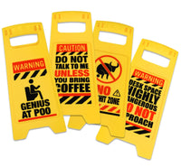 The ⚠️ 4 Pack Funny Warning Desk Signs ⚠️ Office Caution Humor Gag Gift Potty Set features yellow plastic signs with hilarious messages about restrooms, coffee, and desk dangers—ideal for coworker gifts or office pranks.