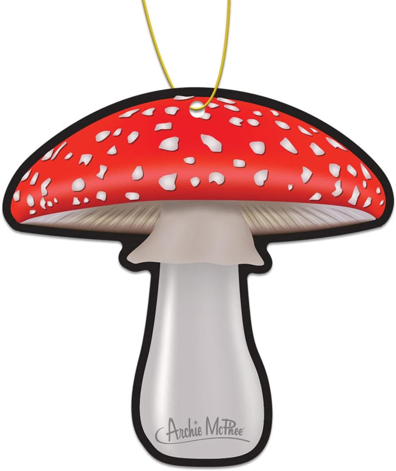 Introducing the Arommatic Mushroom Car Air Freshener by Archie McPhee, a charming car accessory with a red cap, white spots, and a yellow string. Enjoy the soothing sandalwood scent for a delightful driving experience.