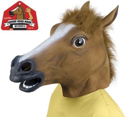 A person wears a brown latex horse head mask with wide eyes and an open mouth, reminiscent of THE ORIGINAL HORSE MASK by Archie McPhee. A label nearby notes it as the "Horse Head Mask" recommended for ages 14 and up.