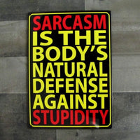 Metal Tin Sign "Sarcasm Is The Body's Natural Defense Against Stupidity"  #E-101