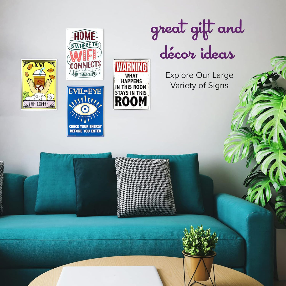 Colorful retro signs adorn the wall above a teal sofa, including a humorous TEQUILA metal sign reading "TEQUILA: Have You Hugged Your Toilet Today!" with a green plant and wooden table in the foreground. Text on wall: "Great gift and décor ideas. Explore Our Large Variety of Signs." Bring some laughter to your space!