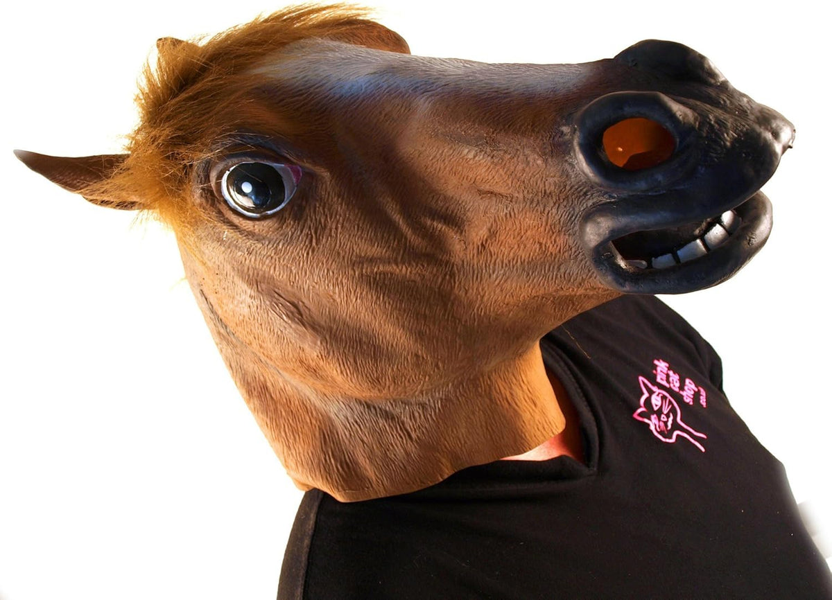 A person wearing THE ORIGINAL HORSE MASK by Archie McPhee, styled with a black shirt and radiating an eerie realism.