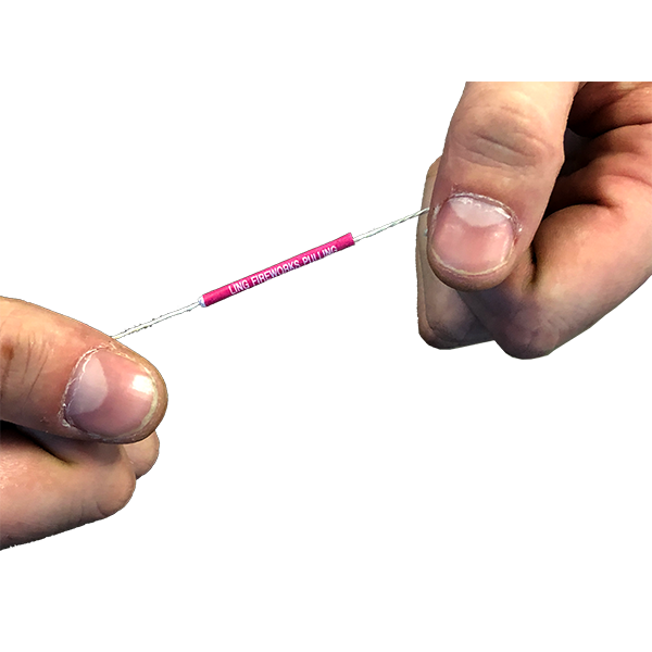 Two hands pull a booby trap string with a small pink firework in the middle—perfect for classic pranks. Get our 12-PACK - BOOBY TRAP STRINGS 💥💣 Funny Classic Joke Gag Pranks for loud, surprising fun!.