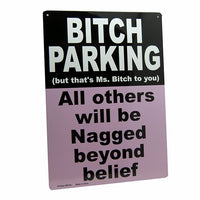 This metal tin sign, titled "Bitch Parking - all others will be nagged!" (Product #A-101), humorously declares: "Bitch Parking (but that's Ms. Bitch to you). All others will be Nagged beyond belief," in bold black and pink.