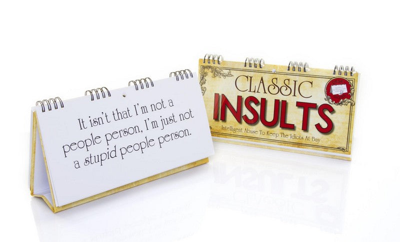 Two spiral-bound desk calendars make the perfect novelty gift: one features the "CLASSIC INSULTS Desk Spiral Flip Book - Funny Office Message Table Signs" on the cover, while the other humorously declares you’re not a "stupid people person.