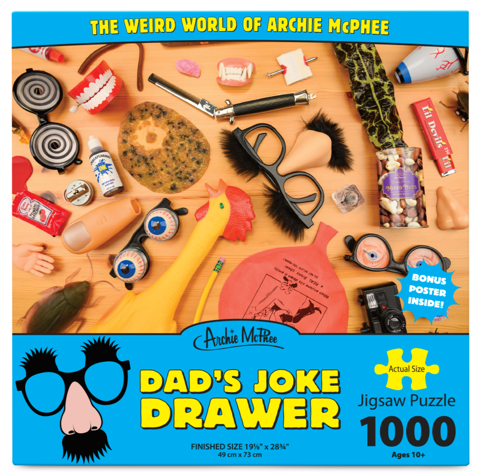 Explore the vibrant "Dad's Joke Drawer Puzzle ~ GaG's & Prank Items! ~ Weird World of Archie McPhee," a 1000-piece jigsaw puzzle packed with novelty items such as rubber chickens, glasses, and quirky props. Suitable for ages 10 and up, it humorously celebrates classic dad jokes.