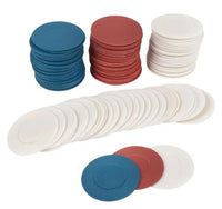 Stacks of red, white, and blue poker chips from the 2500 Plastic Poker Chip Set - Red White Blue - bulk lot, with extra economical white chips spread out in the foreground. Perfect for your next poker night!