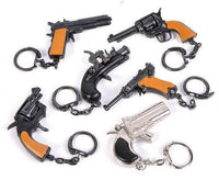 12 Vintage 80's mini key chain diecast metal pistol cap gun - die cast display