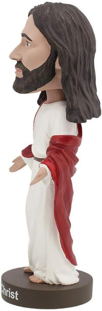 The 🙏 Jesus Bobblehead Figure by Royal Bobbles✝️ is a premium, lifelike collectible gift featuring Jesus in a white robe and red sash—perfect for fans and collectors.