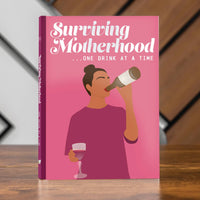 Surviving Motherhood... One Drink at a Time Hardcover Book - Funny Gag Joke Gift