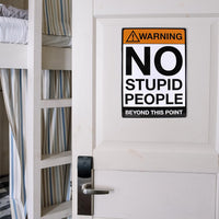 Next to the bunk bed, a quirky touch of novelty decor features the metal tin sign "Warning: NO STUPID PEOPLE Beyond This Point" from Bar Man Cave #C-101.