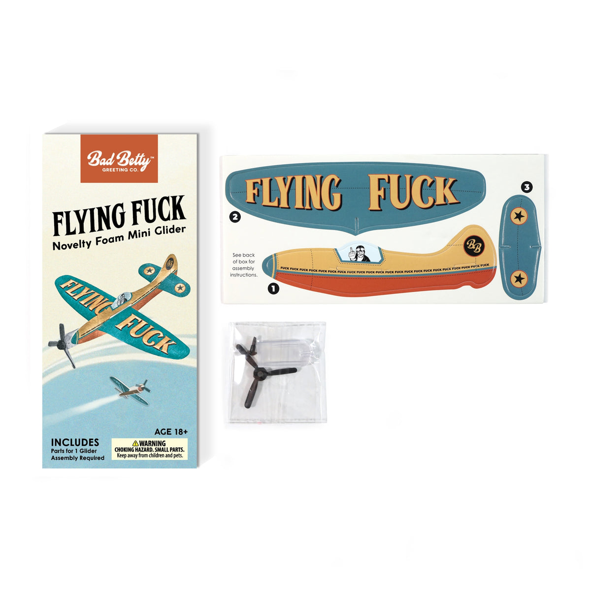 Box and components of the ✈️🤣 FLYING FU%K – The Mini Plane Glider That Says It All! 🙌😂 Adult Gag Joke, including plane parts and a small bag with a propeller.
