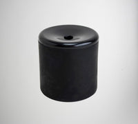 This cylindrical black object with a smooth, shiny finish and a central hole on the top surface is an impeccable representation of the 12 Le Tooter Pooters - Party Favor Gag Joke Fart Farting Gifts (1 dozen), an artificial flatulence maker sure to bring humor to any situation.