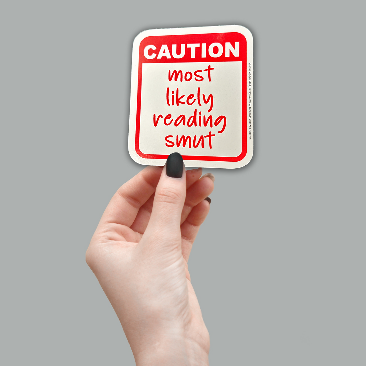 "CAUTION: most likely reading smut" Funny Sticker Die-Cut Decal - Made in USA