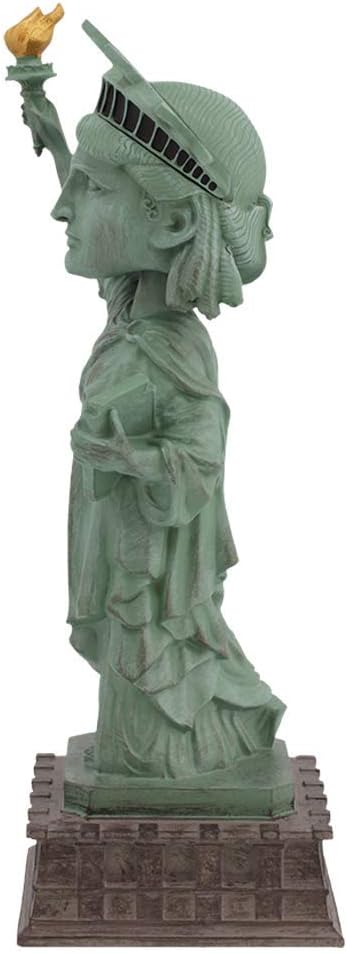 A side view of the Statue of Liberty Bobblehead Figure 🗽 – Premium Lifelike Collectible Decor Gift, showing her with torch and tablet on a patterned base—an ideal collectible from Royal Bobbles.