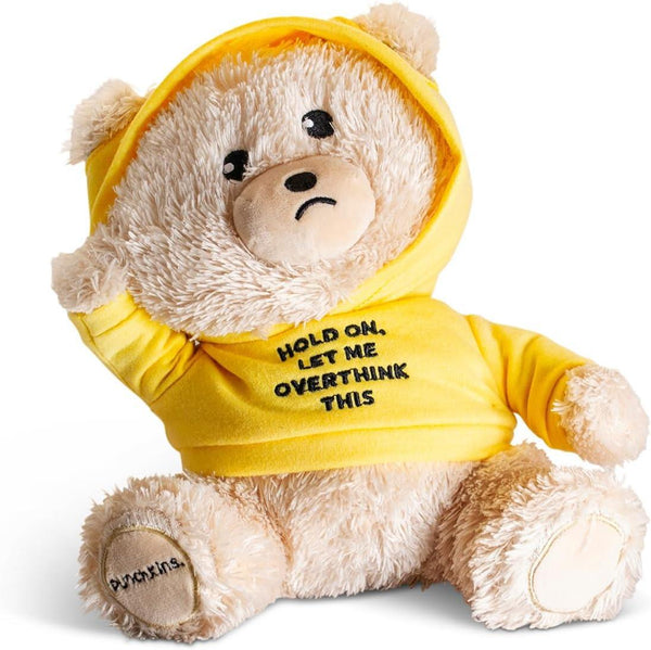 The Punchkins 🐻 "Let Me Overthink This" Teddy Bear Plushie wears a yellow hoodie with the phrase and has a concerned look—making it the perfect gift for overthinkers.