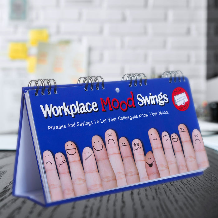 The "Workplace Mood Swings - Desk Spiral Flip Book - Funny Office Message Table Signs" blends office humor with communication by showcasing fingers decorated with different facial expressions, creating the ultimate mood flip book and a playful gift for colleagues.